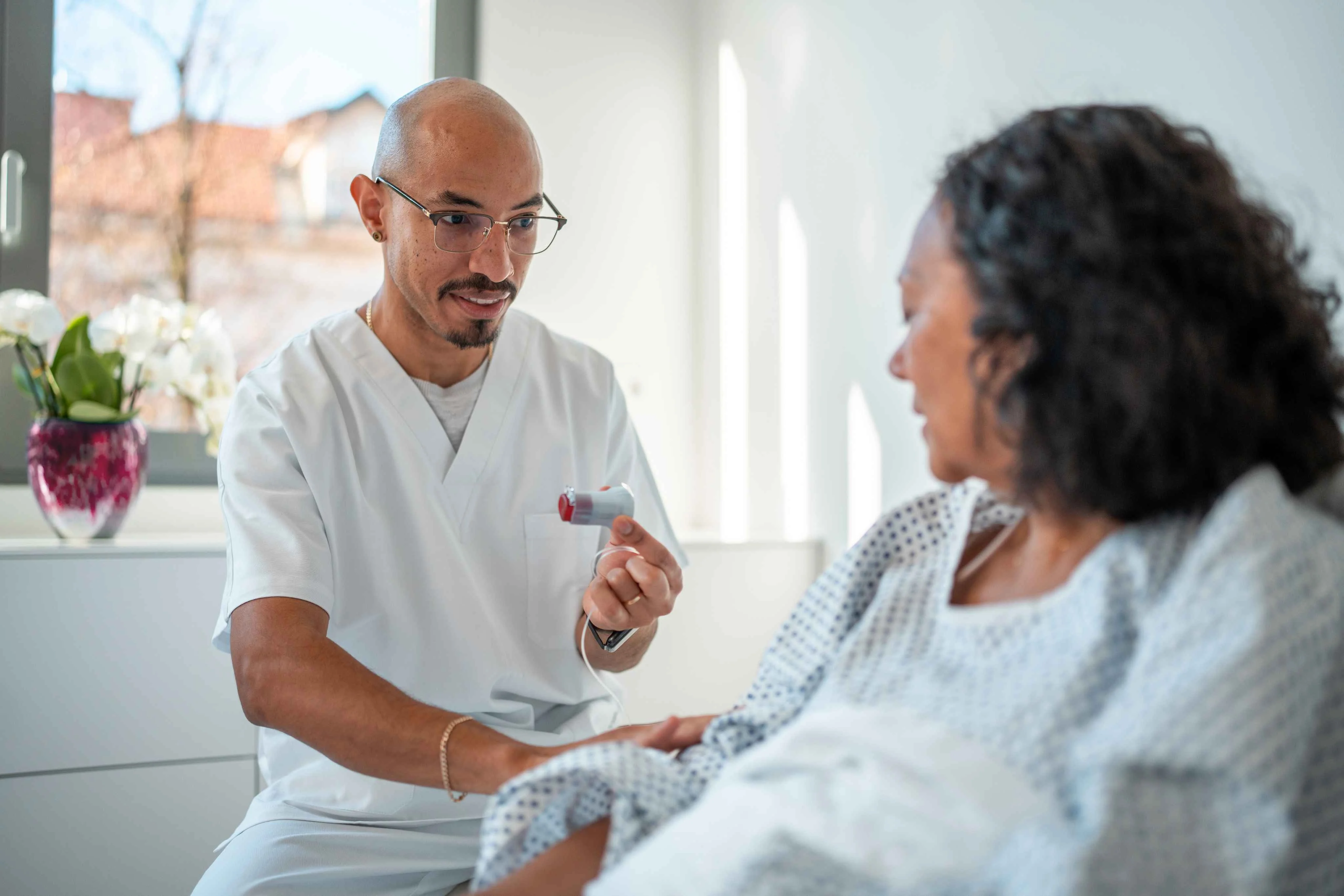 a man and a woman looking at a cell phone