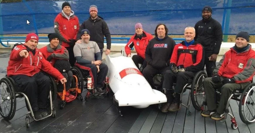 a group of people in wheelchairs