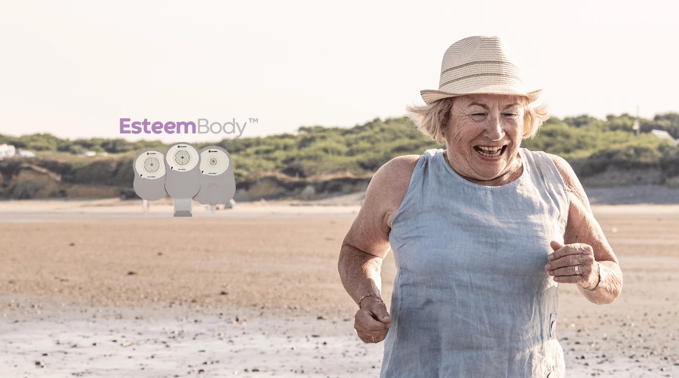 a person wearing a hat and standing on a beach